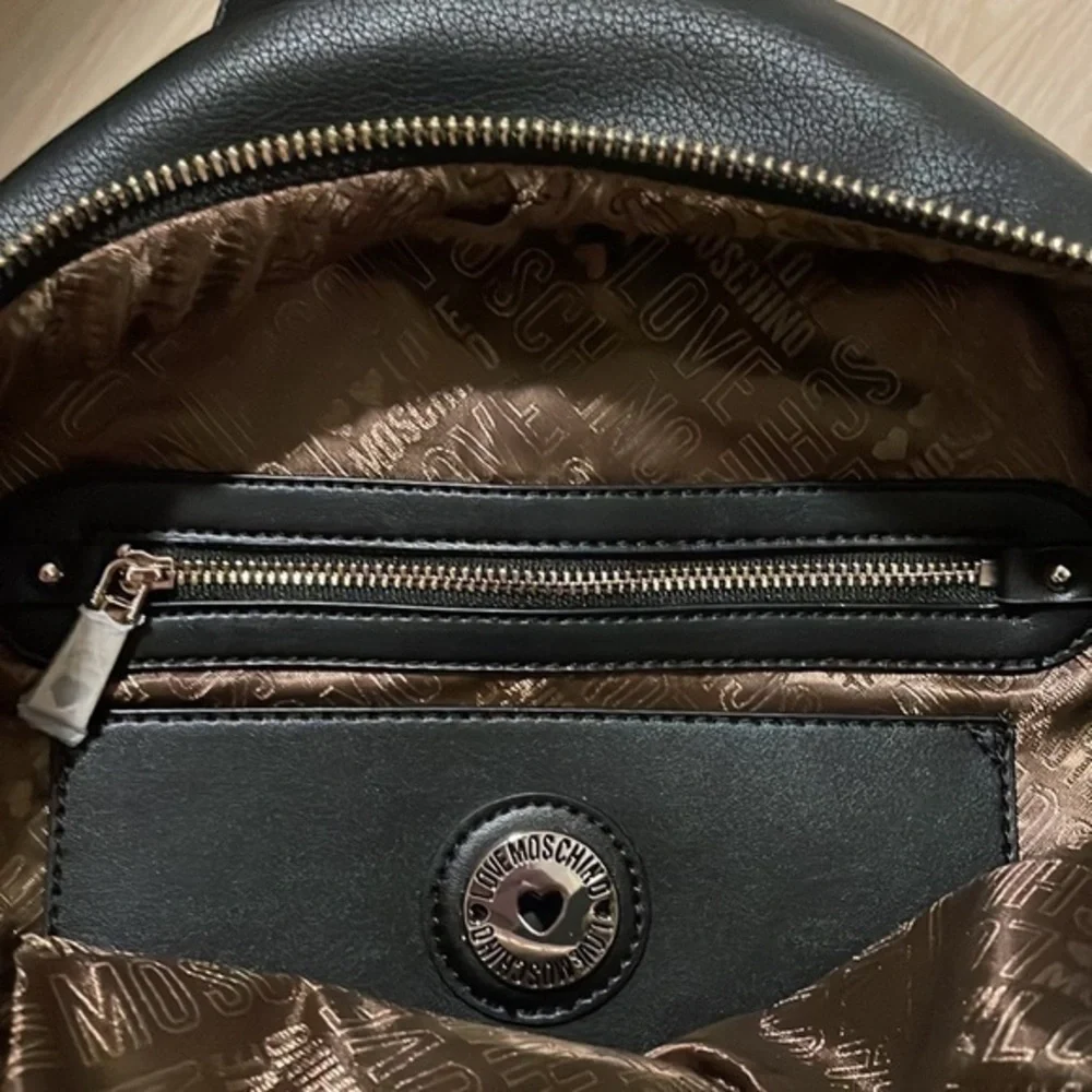 LOVE  MOSCHINO Black logo and fringe backpack